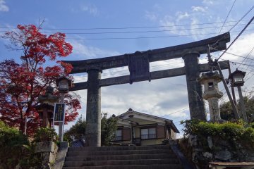 Kane no Torii, a big copper gate, one of four gates on the way to Mount Sanjo